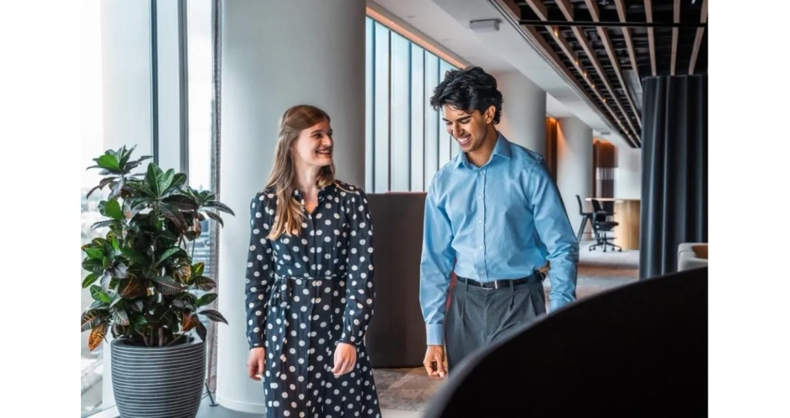Freshfields trainees man and woman speaking